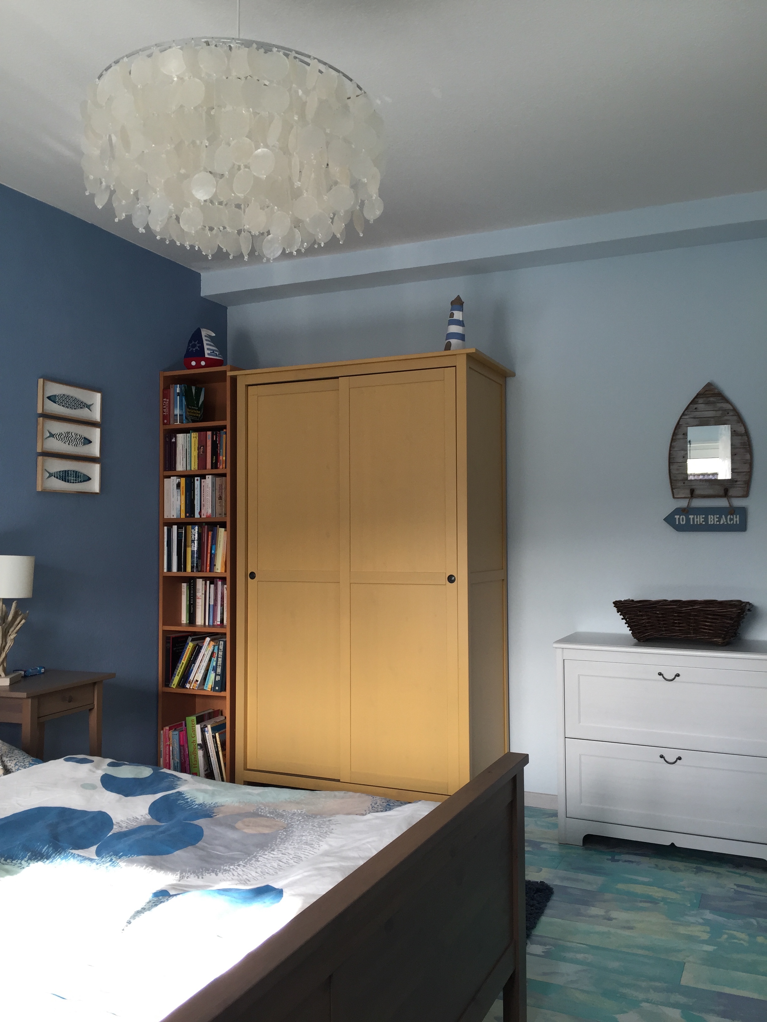 Bedroom wardrobe and bookshelf with nautical details